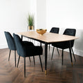 Oak Extendable Dining Table with Matte Black Legs and Gold Accents