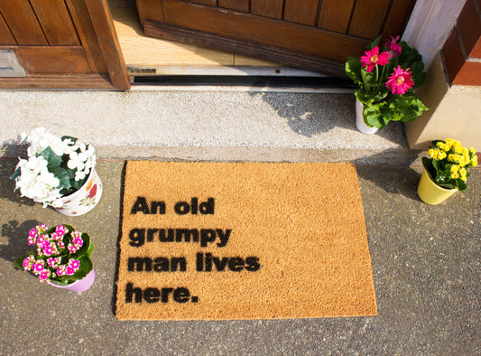 'An Old Grumpy Man Lives Here' Welcome Doormat